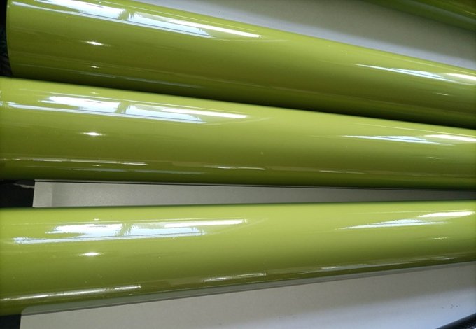Roll wrapped fiberglass tube feature